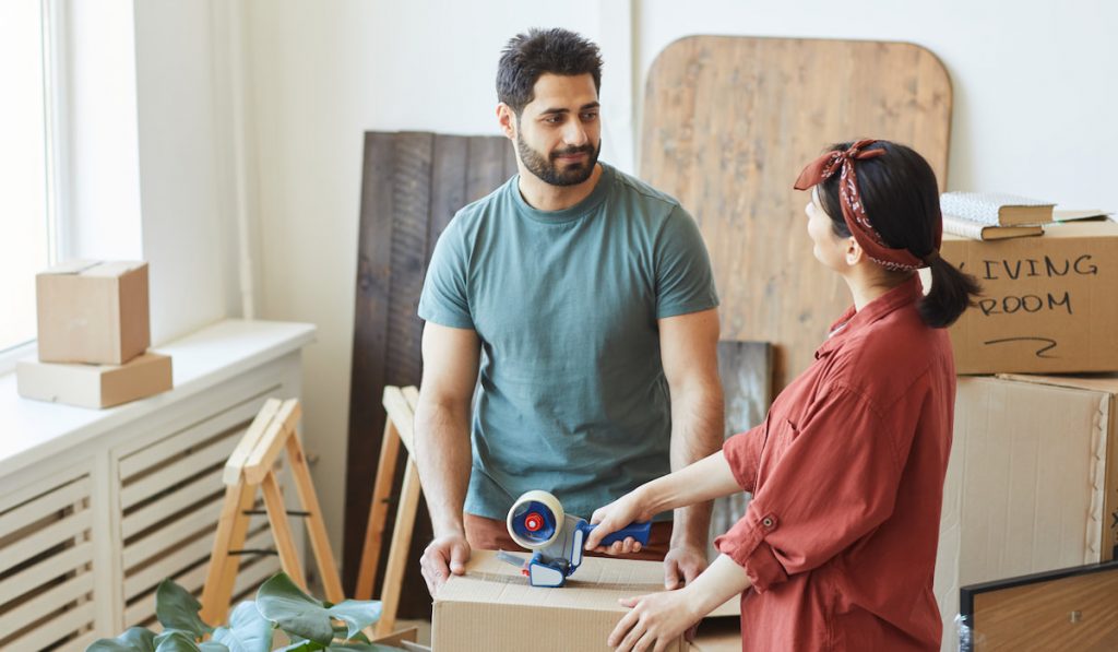 Couple moving in new apartment
