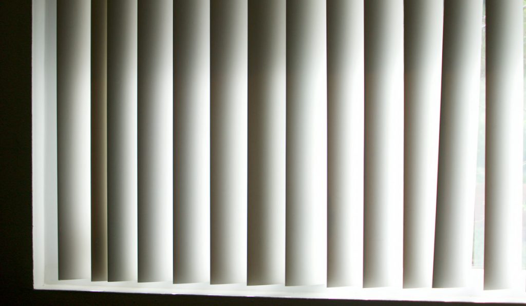 Venetian vertical blinds light and shadows